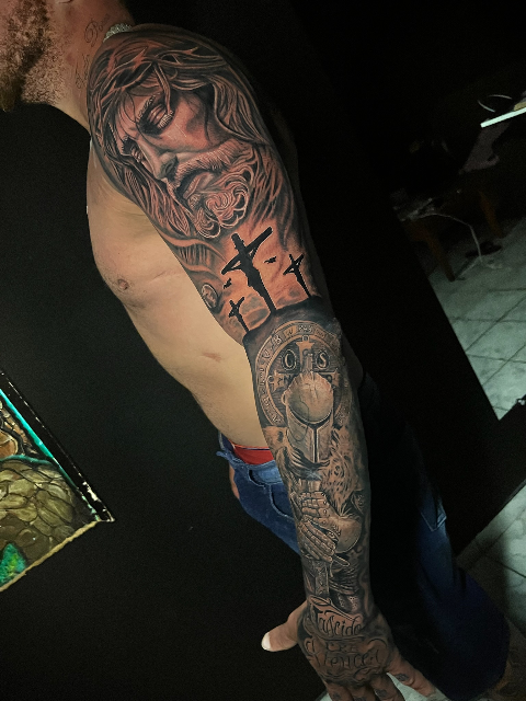 Arm side tattoo