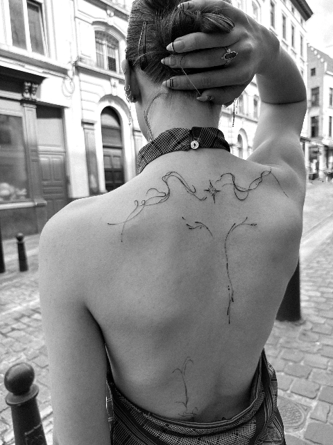 Abstract Fine Line Flow Tattoo on the Back