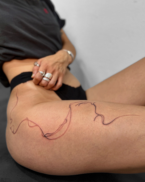 Abstract Fine Line Flow Tattoo on the Thigh