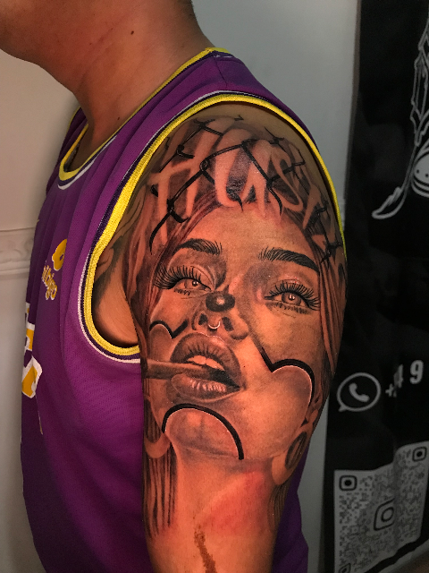 Hustle Chicano tattoo